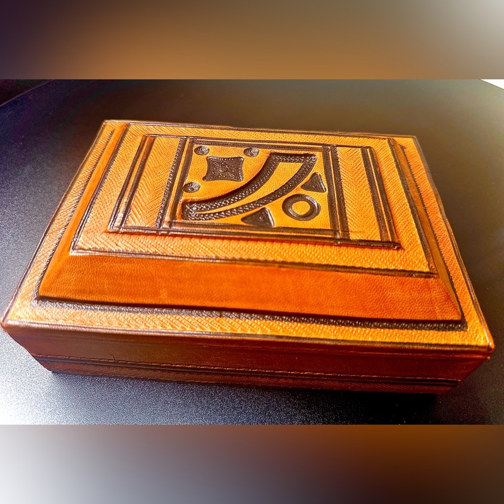 This exquisite leather box features made out Leather and wood from Touareg